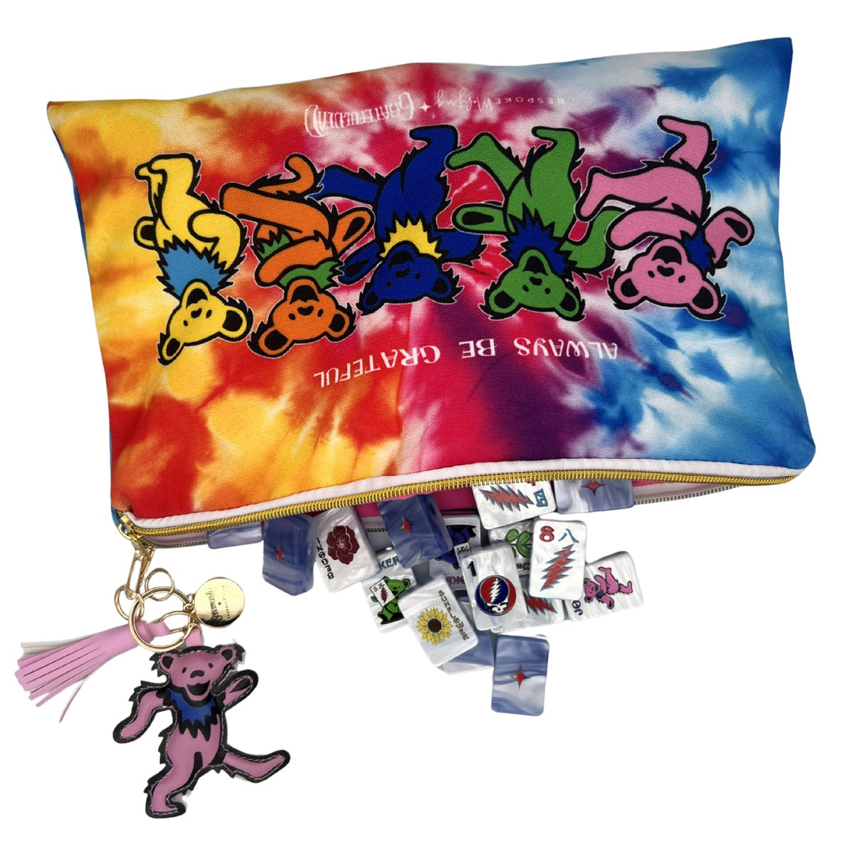 Grateful Dead x Bespoke Mahjong tie-dye Dancing Bears tile bag with Sunshine Daydream pearl tiles spilling out and the pink puffy Dancing Bear zipper pull