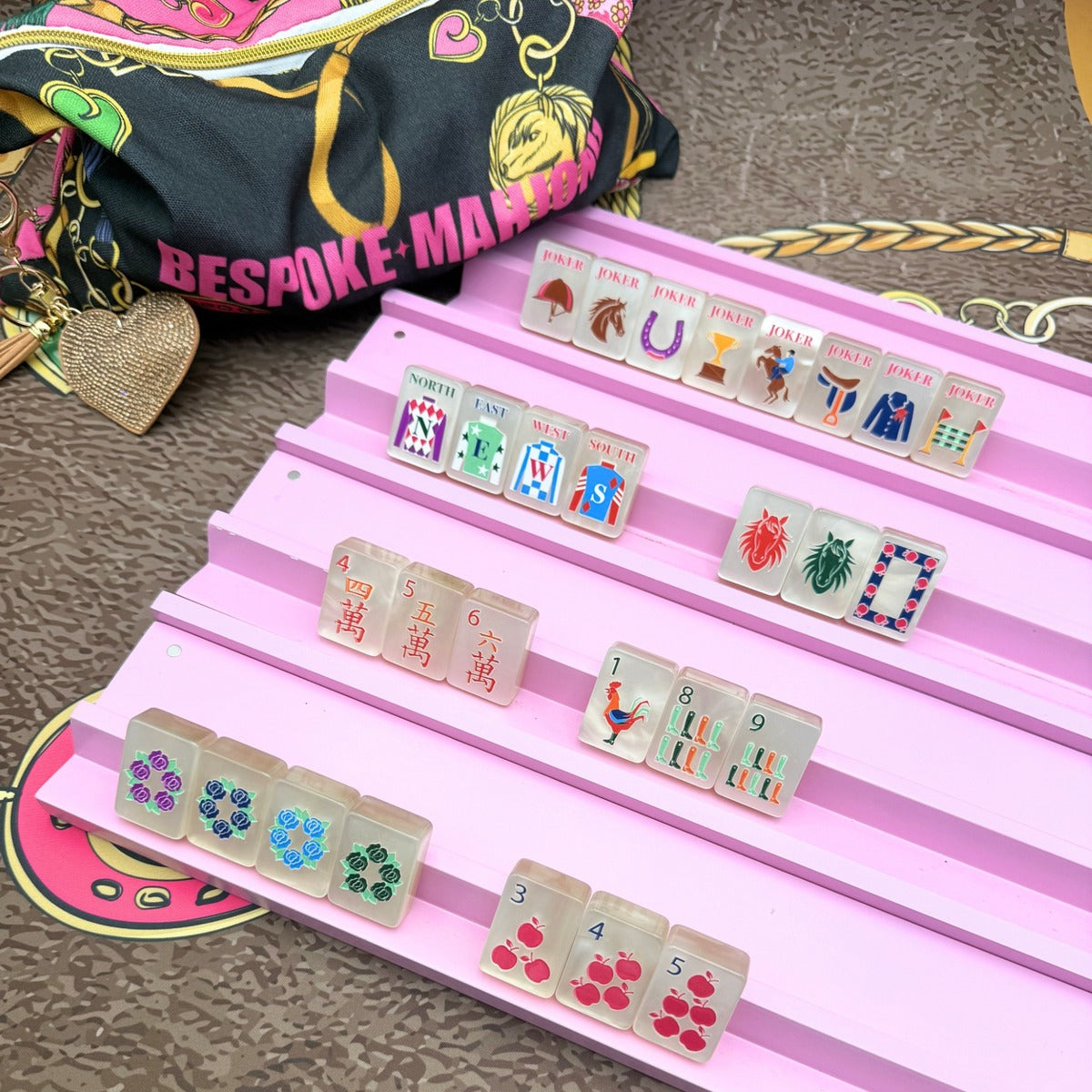 Year of the Horse Pearl Cream tiles on pink racks with the black and hot pink equestrian tile bag; racks sold separately