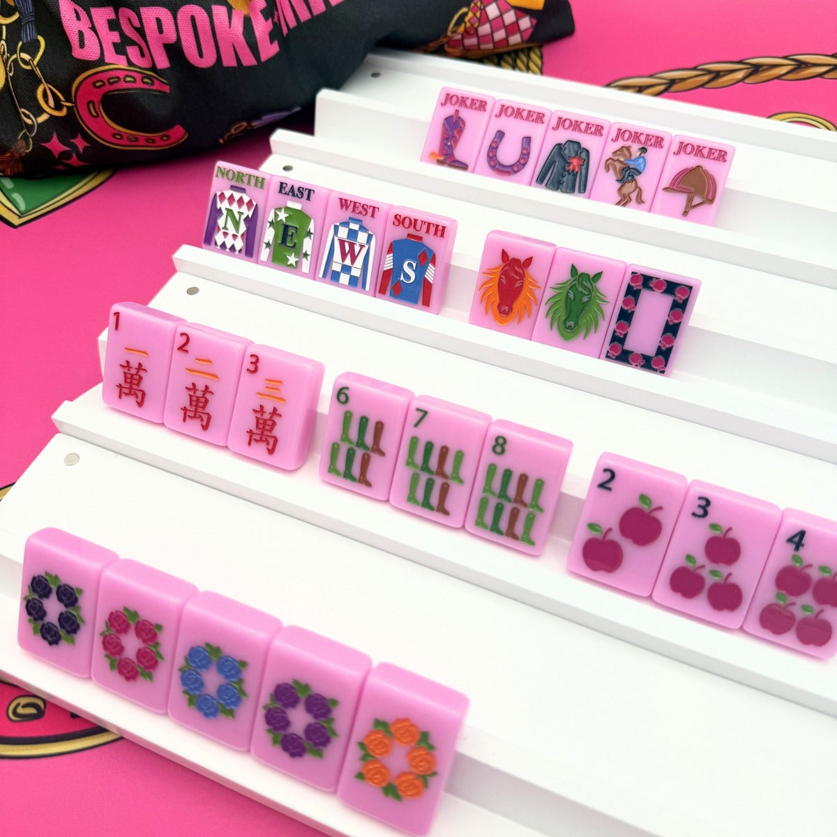 Year of the Horse Saddle Pink tiles on white racks with the black equestrian tile bag; racks and mat sold separately