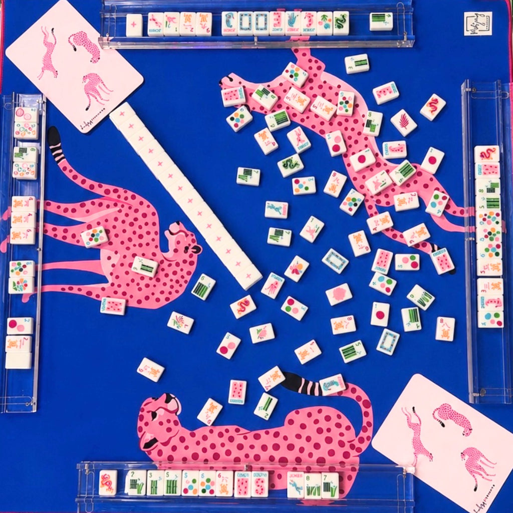 Springtime Safari Bright White tiles spread on a cheetah-print mat with clear racks; racks and mat sold separately