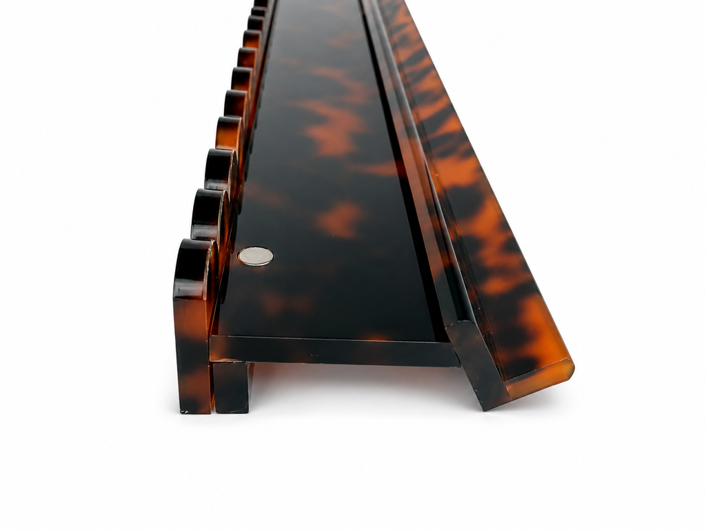 Tortoiseshell rack and scalloped pusher