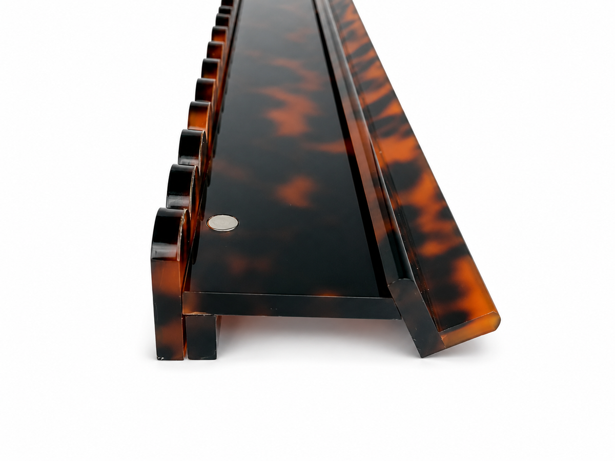 Tortoiseshell rack and scalloped pusher