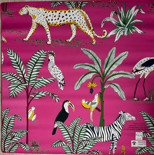 Hot pink side of the Dhonk jungle mahjong mat with cheetahs, toucans, and palms