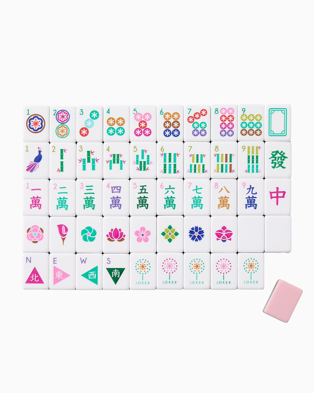 One of each Oh My Mahjong La Fete tile face laid out in rows: dots, bams, craks, flowers, winds, and jokers, with a blush pink tile back