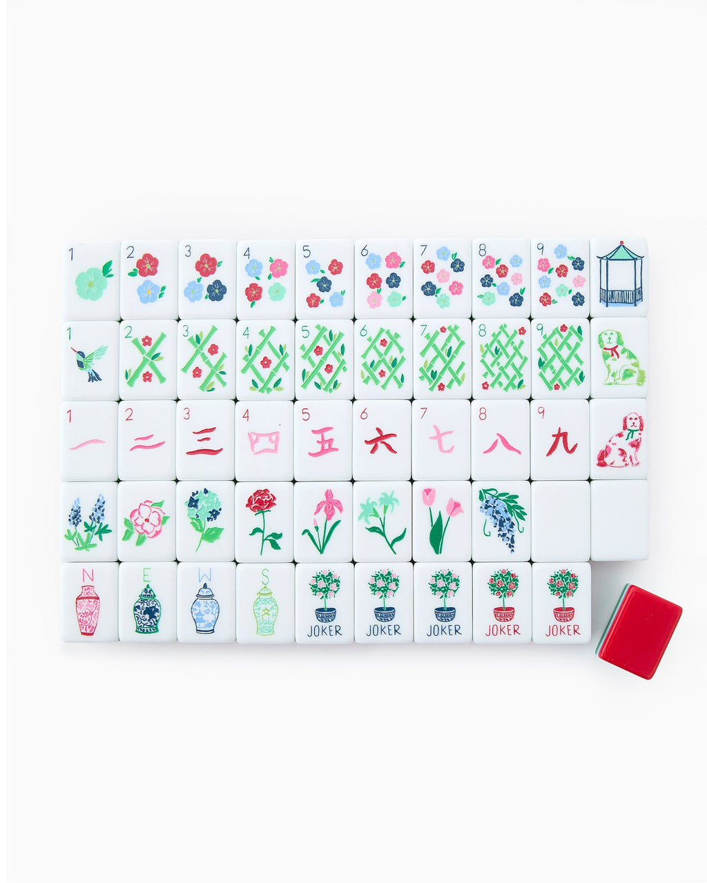 One of each Oh My Mahjong Nantucket tile face laid out in rows: dots, bams, craks, flowers, winds, and jokers, with a red tile back