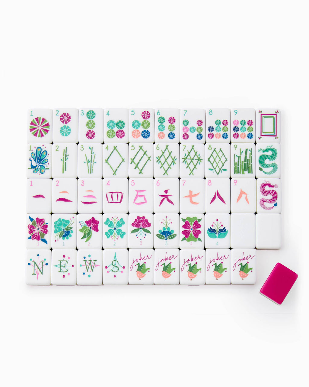 One of each Oh My Mahjong Dandy tile face laid out in rows: dots, bams, craks, flowers, winds, and jokers, with a magenta tile back