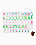 One of each Oh My Mahjong Glow Wild tile face laid out in rows: dots, bams, craks, flowers, winds, and jokers, with a tortoiseshell tile back