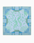 Oh My Mahjong Isla instructional mahjong mat laid flat, peacocks in soft green on cool blue