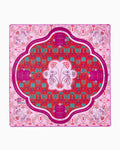 Oh My Mahjong x Sheridan French Mirage instructional mahjong mat laid flat with palms and animals in coral and magenta
