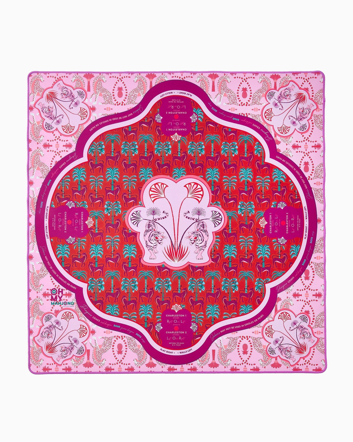 Oh My Mahjong x Sheridan French Mirage instructional mahjong mat laid flat with palms and animals in coral and magenta