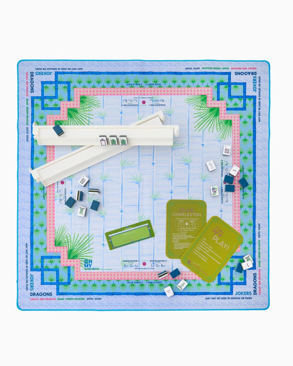 Palm Paradise mahjong mat set up with racks; tiles and racks sold separately