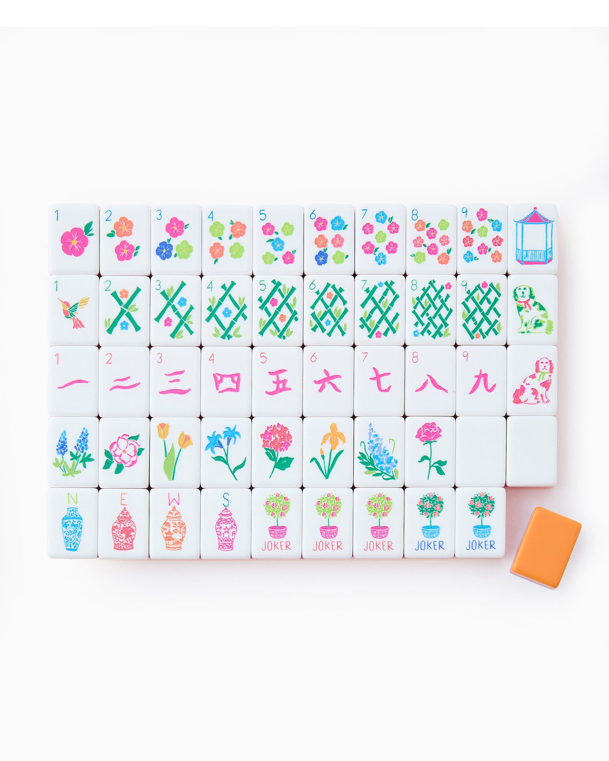 One of each Oh My Mahjong Sunset tile face laid out in rows: dots, bams, craks, flowers, winds, and jokers, with an orange tile back