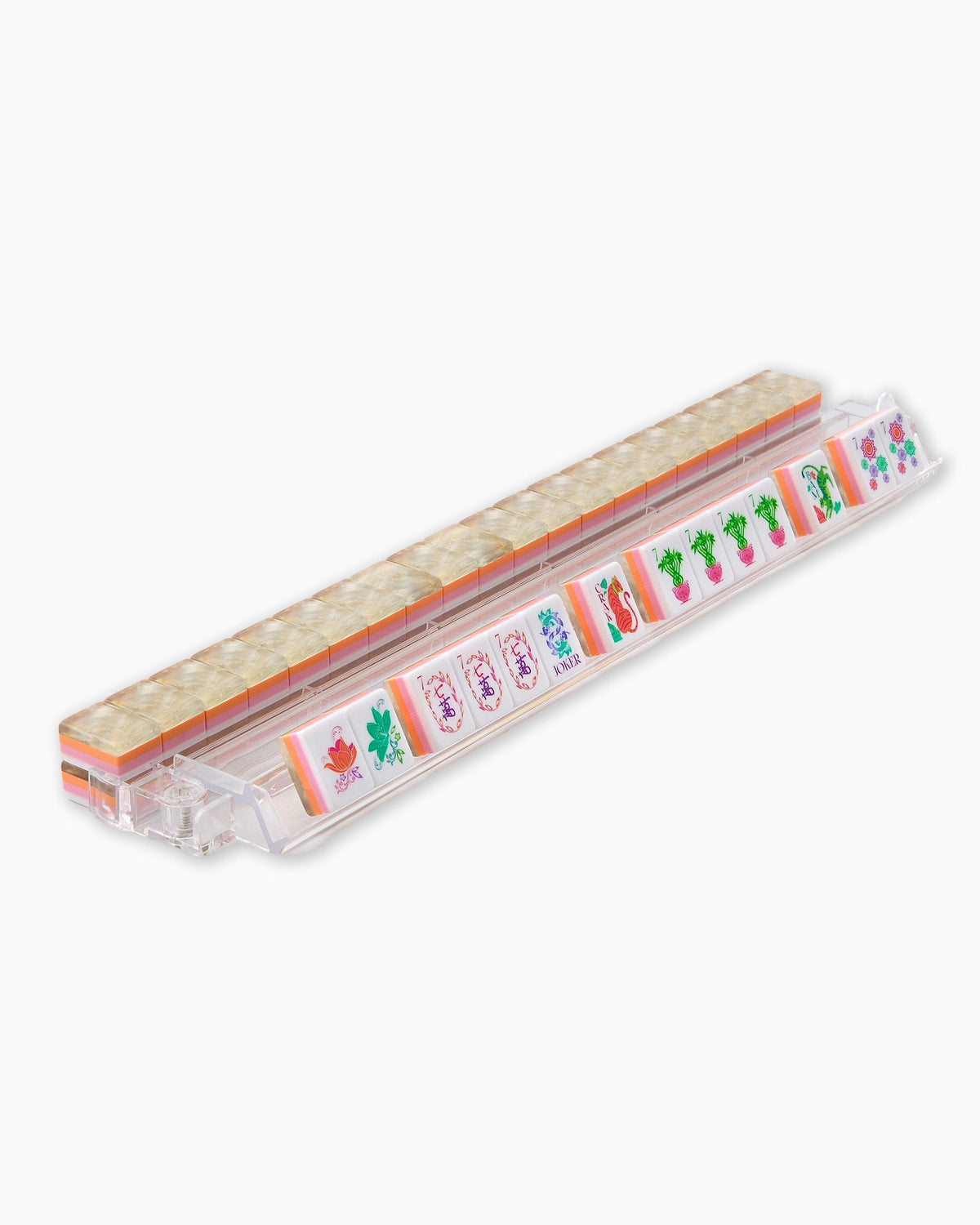 Pearlescent mahjong tiles on a clear acrylic rack, a row of face-up tiles in front and pearly tile backs lined up behind