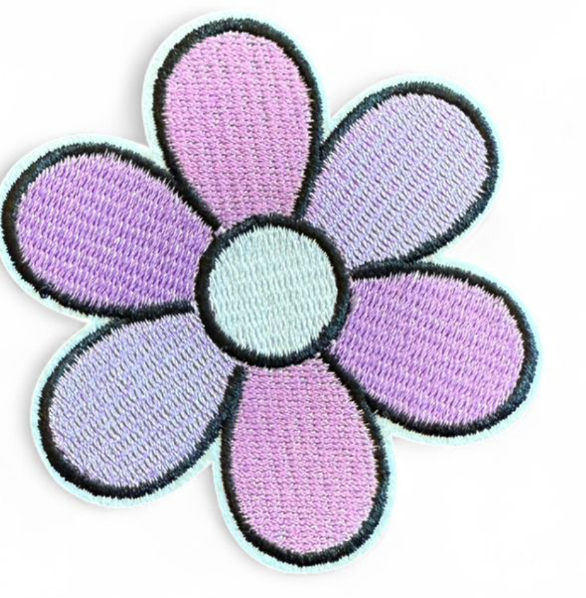 Daisy self-adhesive patch included with the Patch Perfect tote