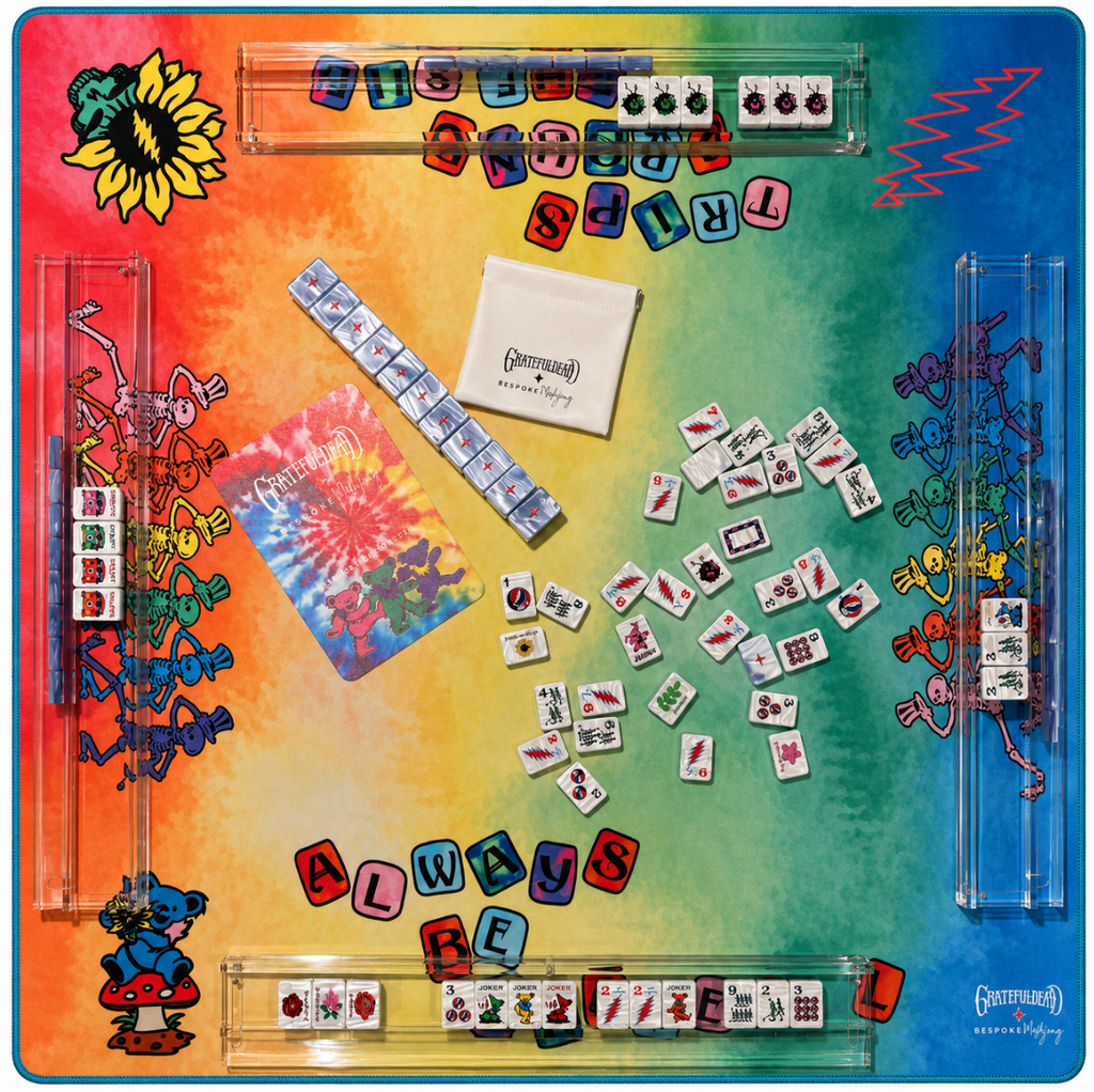 Rainbow tie dye side of the Grateful Dead mahjong mat set up with tiles and racks; tiles and racks sold separately