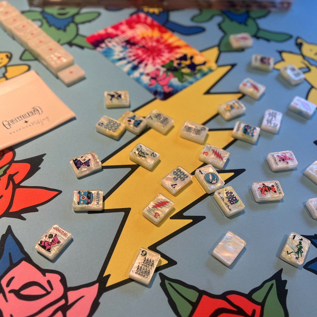 Close view of tiles on the lightning bolt and roses artwork; tiles sold separately