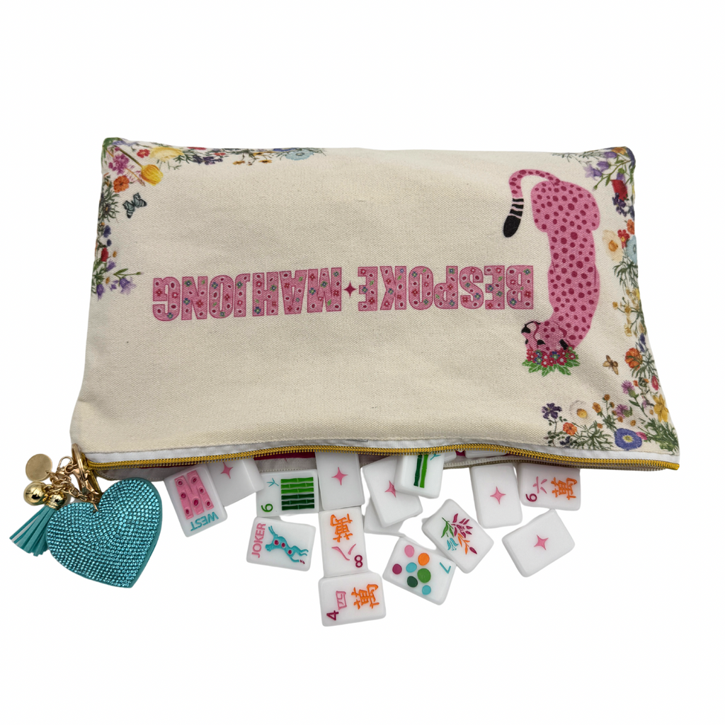 Bespoke Mahjong Springtime Safari canvas tile bag with pink leopard, floral trim, and puffy heart zipper pull, tiles spilling out; tiles sold separately
