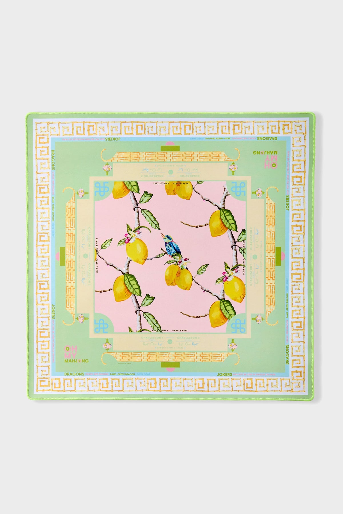 Oh My Mahjong x CoCo Zentner Citrus Songbird instructional mahjong mat laid flat, lemons on pink with a pastel green border