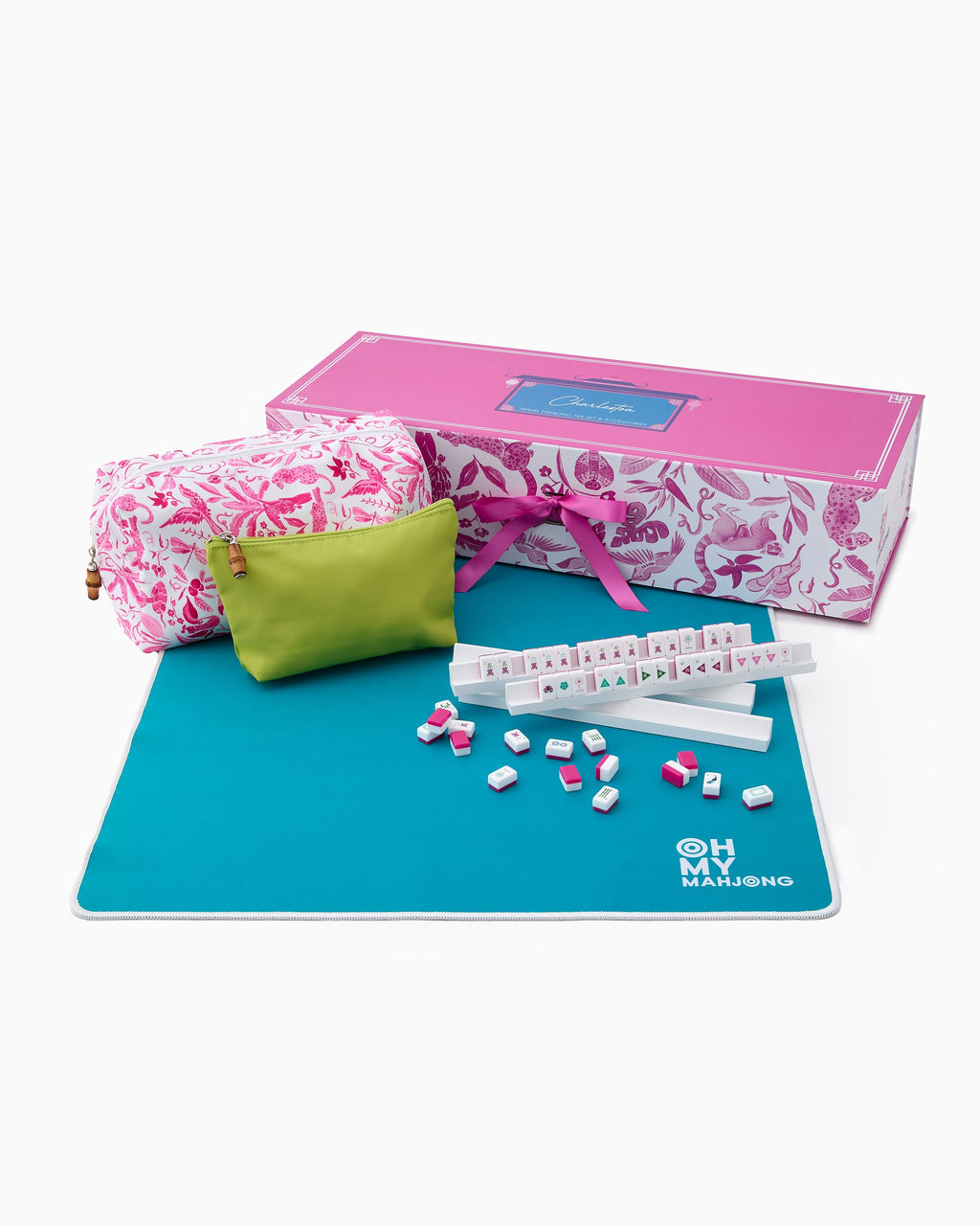 Oh My Mahjong Charleston Travel Set with pink printed bag, teal mat, racks, and tiles