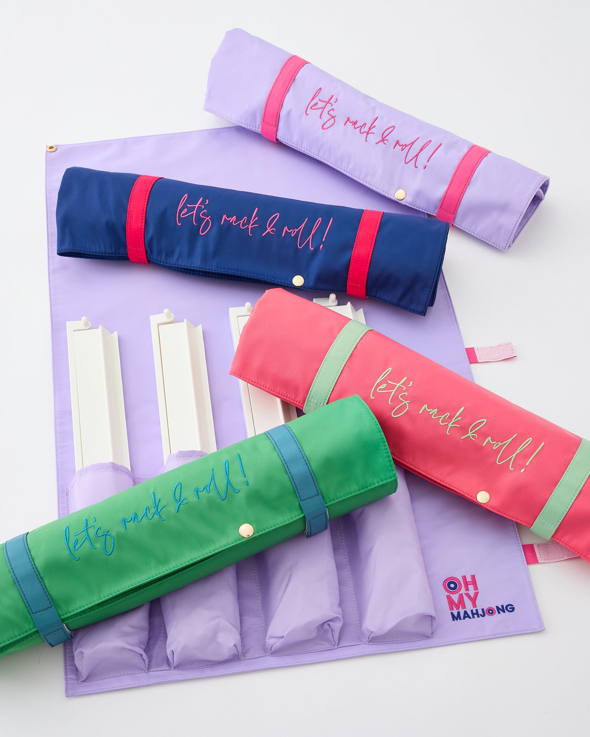 Let's Rack & Roll bags rolled up in several colors