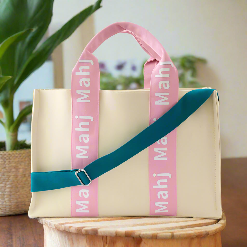 Oh My Mahjong Mahj It All bag in Light Pink with teal crossbody strap