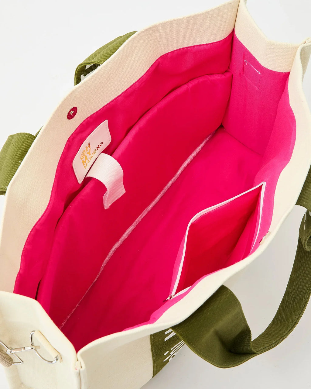 Olive Mahj It All bag interior with hot pink lining and zip pocket