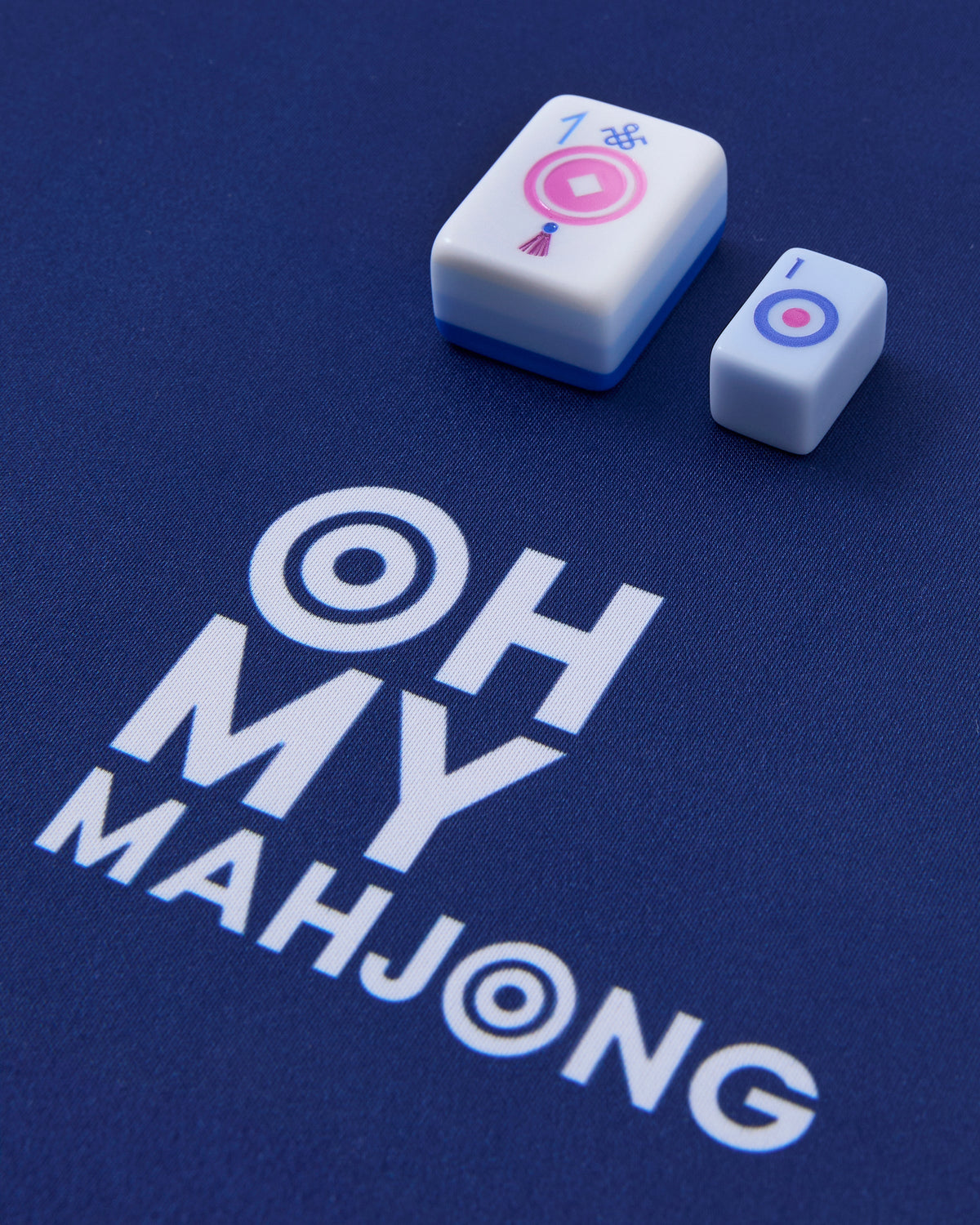Parisian tiles on the navy Oh My Mahjong travel mat