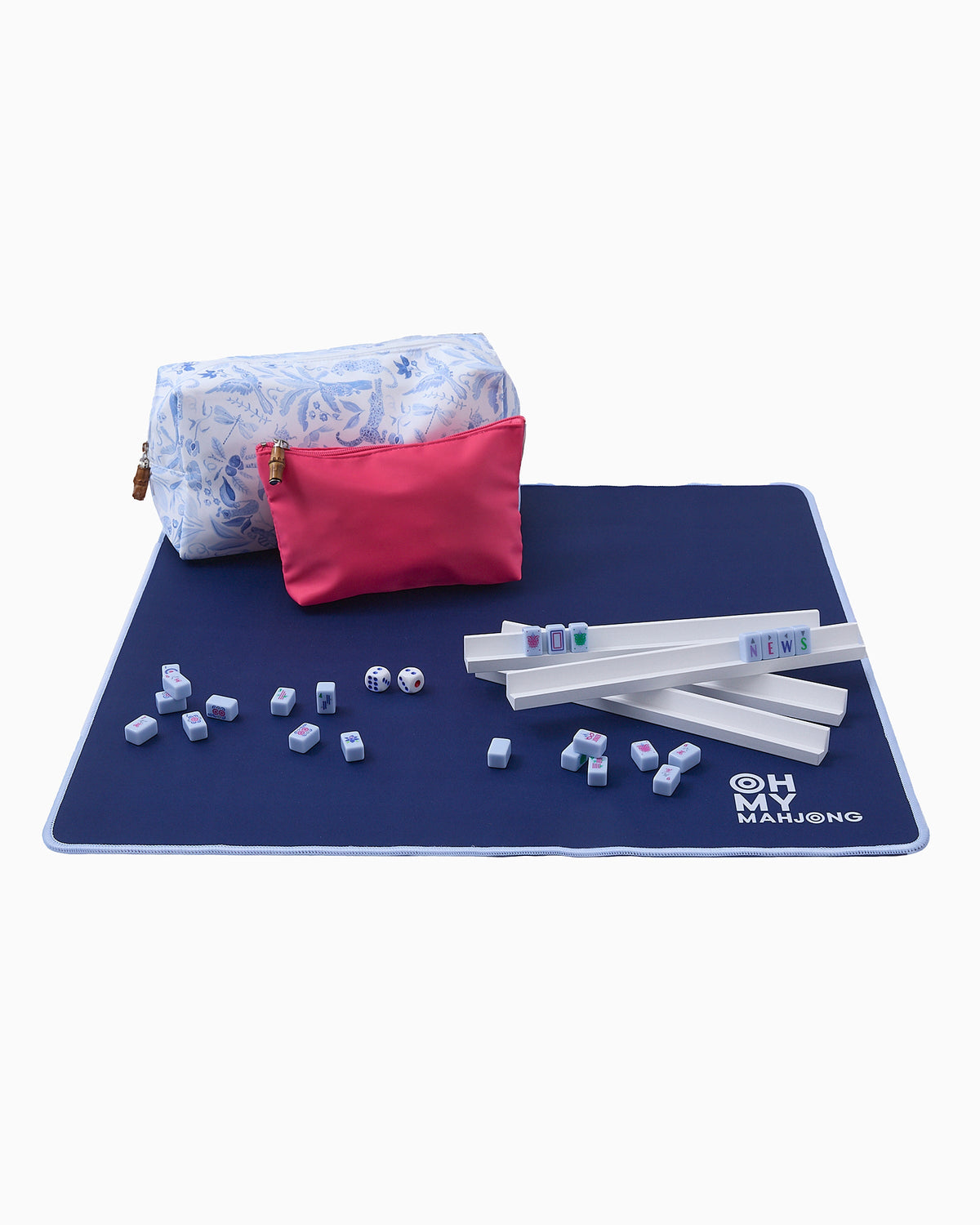Parisian travel set laid out on its navy mat with racks and tiles