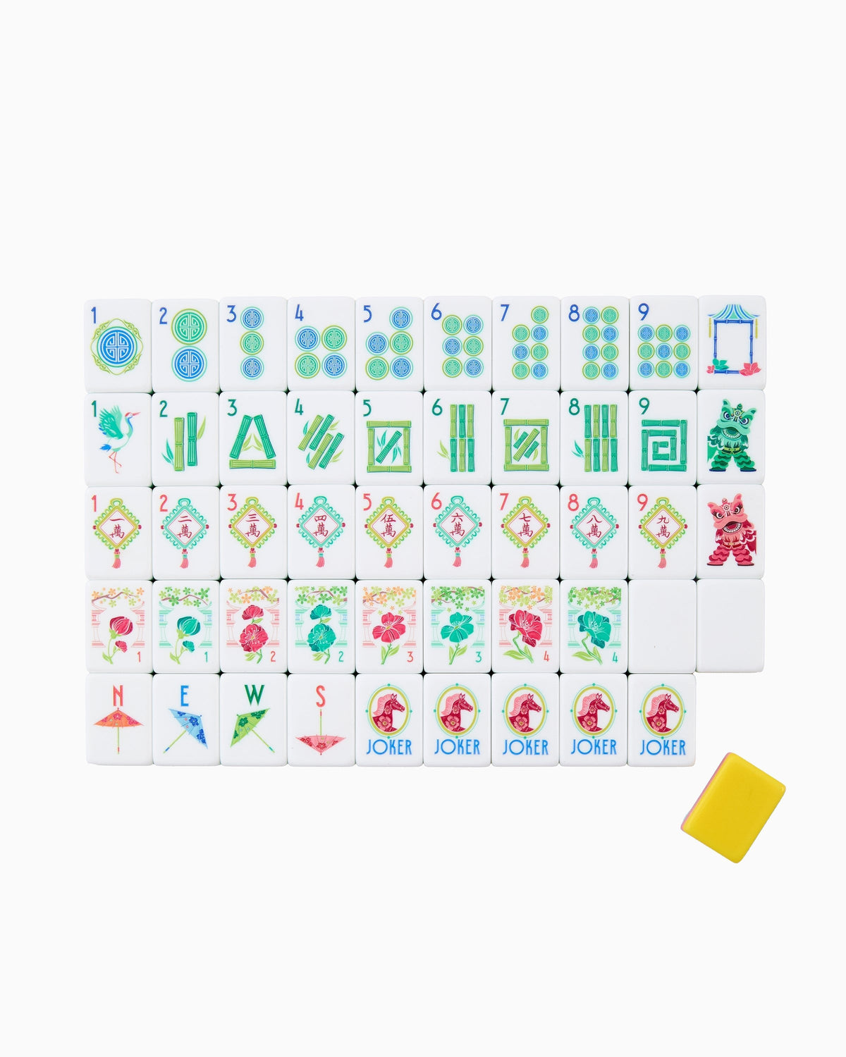 Oh My Mahjong Pippa mahjong tile set laid out, yellow, coral, and turquoise on white tiles