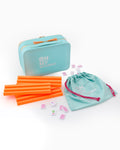 Oh My Mahjong Poppy Debutante mahjong set with teal travel bag, orange racks, and pink tiles