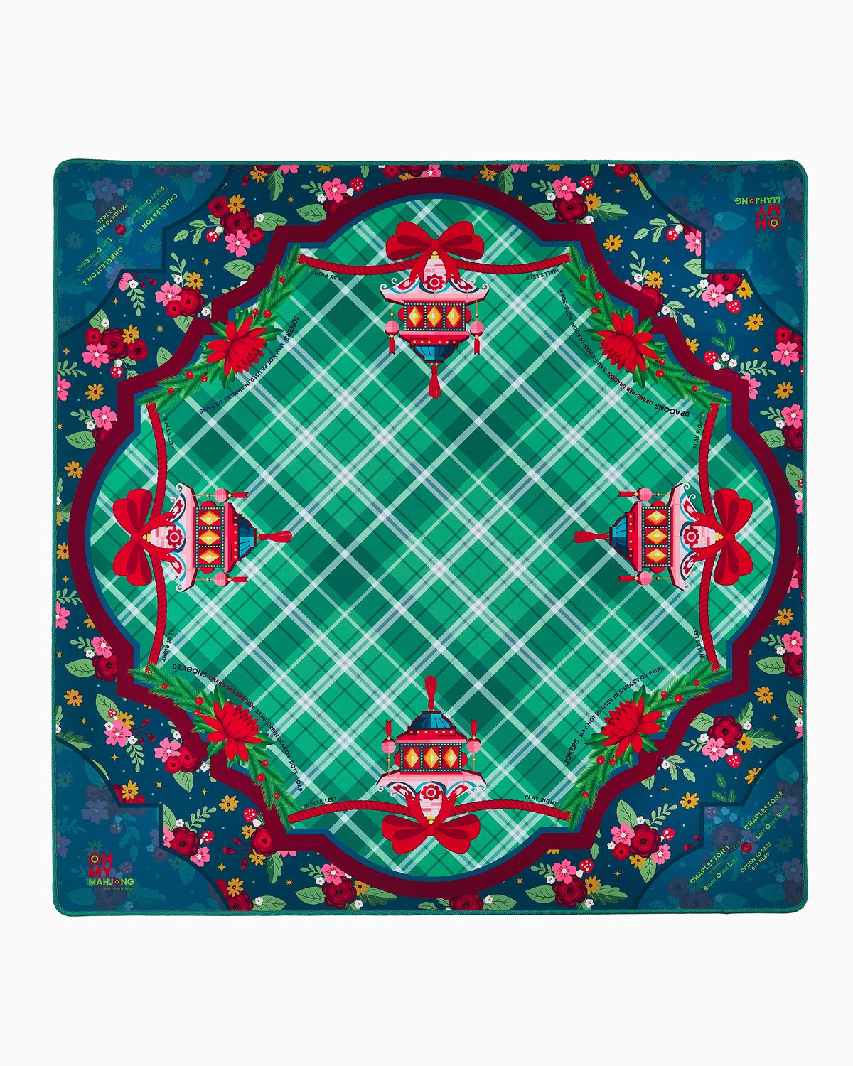 Oh My Mahjong Yuletide holiday mahjong mat laid flat, evergreen and red with a plaid center, lanterns, and bows